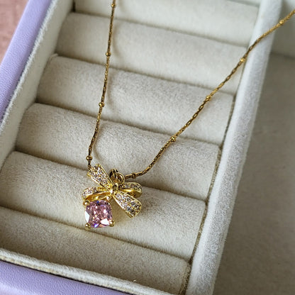 Pink bow pendant chain