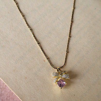Pink bow pendant chain
