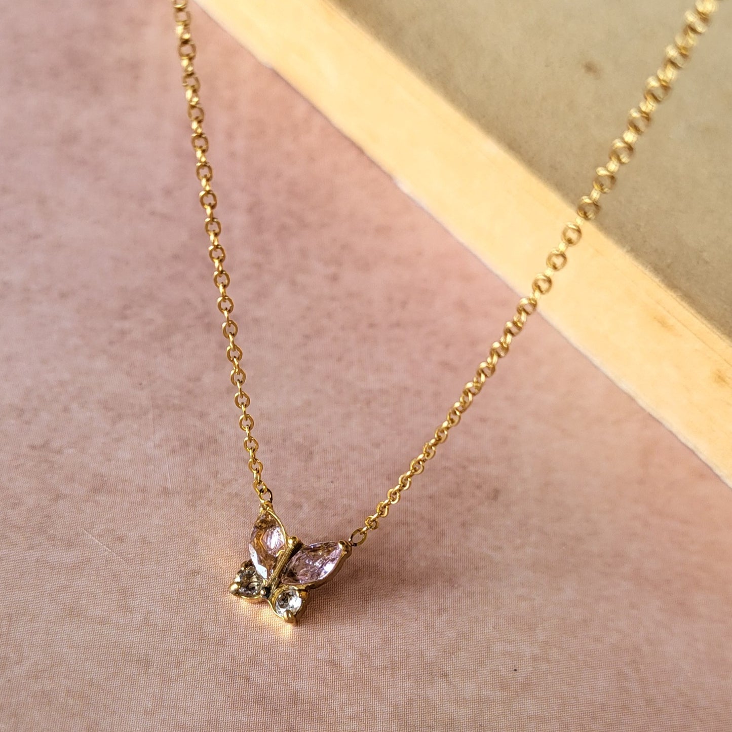 Pink butterfly pendant chain
