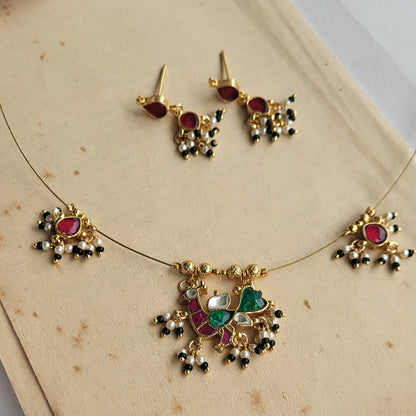 Peacock invisible necklace (Ruby)
