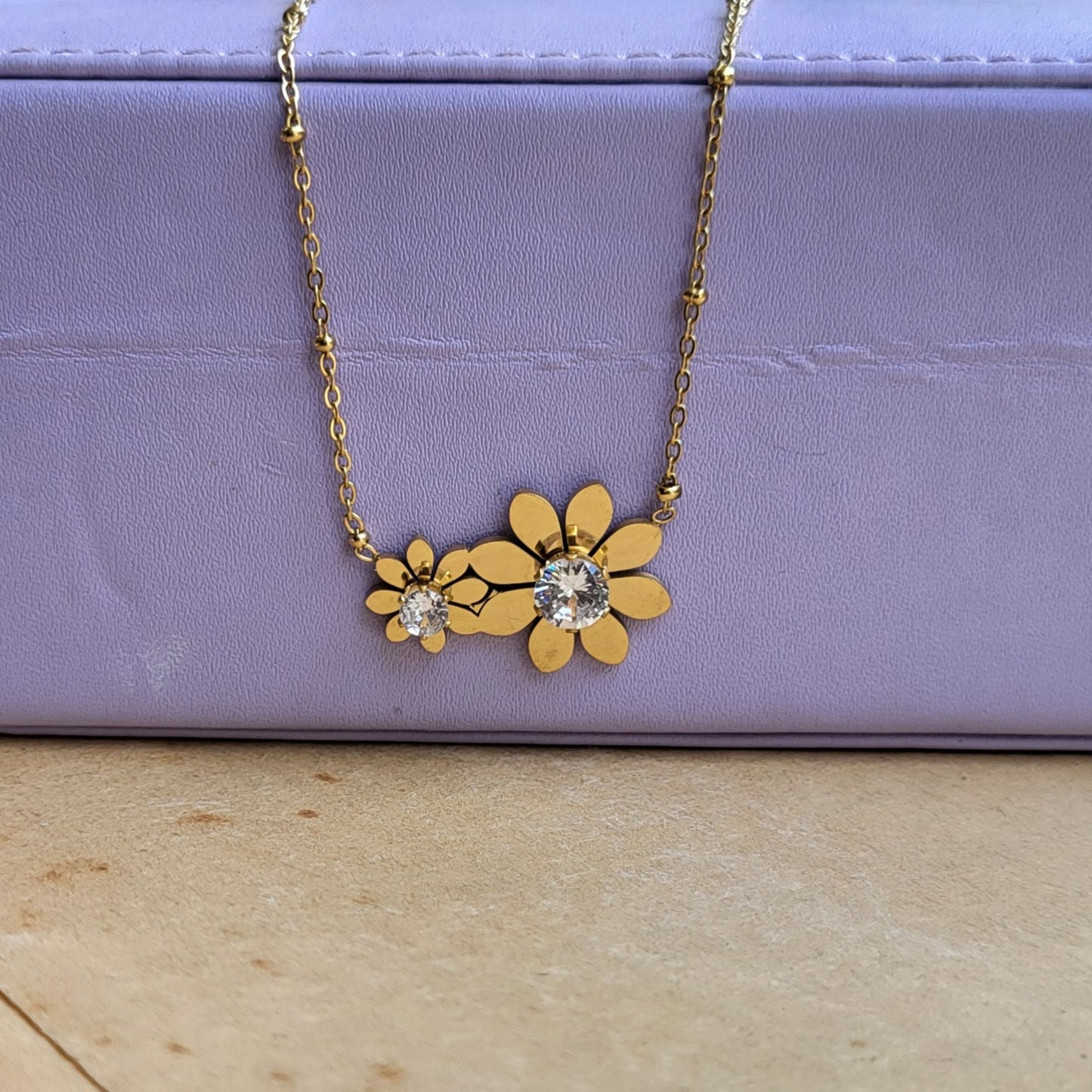 Dual fleur pendant chain